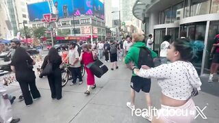 Wild scene at Yonge & Dundas where an argument turns into a fight combined with excha