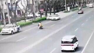 Elderly Lady in China Fails to See Speeding Car and Flies Away