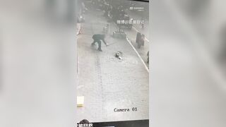 Poor Dog in China with Rabies Bites a Woman then is Put out of its Misery