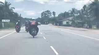 Big Man on Motorcycle not having a Good Day..