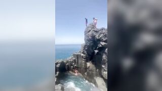 Tourist isn't Supposed to Jump onto the Rocks (See Info)
