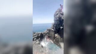 Tourist isn't Supposed to Jump onto the Rocks (See Info)