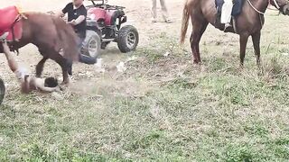 China: Boy is Dragged Head Down by Horse..