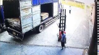 Pallet Jack Driver makes Mistake by Not Lowering his Forks, hits Bump, Crushed Instantly