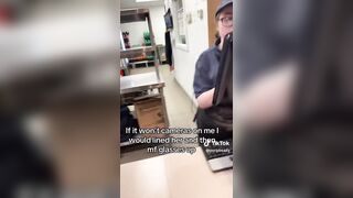 A foul-mouthed black woman berates a white female dominos employees.