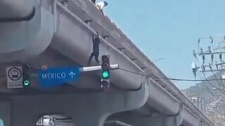 Man Attempts Suicide from Traffic Light Height...A Cry for Help