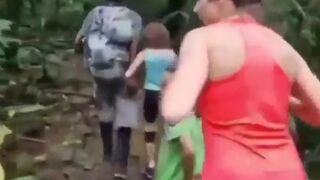 Family Walking with Small Child get a Terrifying Surprise in the Jungle