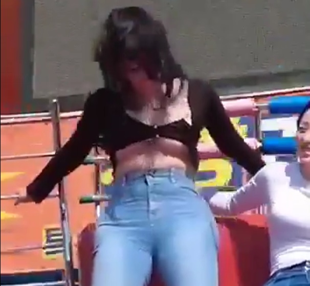 Is She having an Orgasm or just Really has No Idea how to Ride this Amusement Park Ride