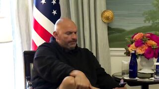 Fetterman legs crossed in shorts for meeting with Netanyahu