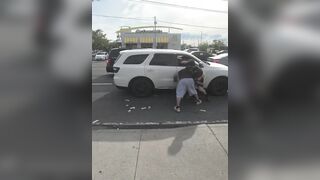 Road Rage Turns Into Free Money Frenzy When Cash Spills Onto the Street