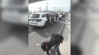 Road Rage Turns Into Free Money Frenzy When Cash Spills Onto the Street