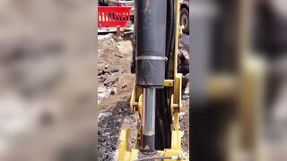 The excavator operator asked her to get away from his machine and she refused