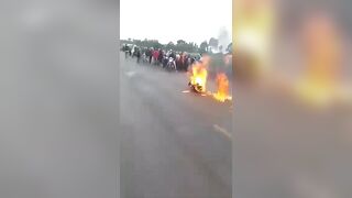 Rapist Wet on Fire by Angry Crowd