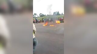 Rapist Wet on Fire by Angry Crowd