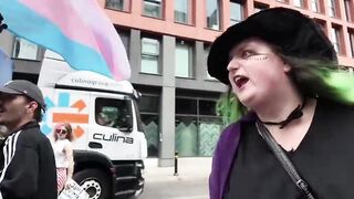 Green-Haired Trans Witch Has Meltdown Over “Trans Women Are Men” Sign