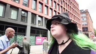 Green-Haired Trans Witch Has Meltdown Over “Trans Women Are Men” Sign