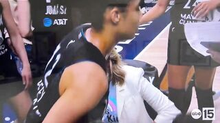 Minnesota Lynx head coach wears ‘Trans Kids Belong’ t-shirt during WNBA game.