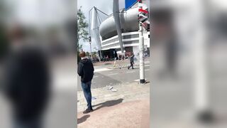 Watch Horror moment football fan loses FINGERS after Setting off Flare outside Stadium in the Netherlands