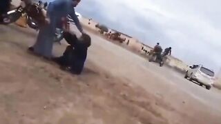 Muslim Woman is Brutally Beaten in the Dirt, Whipped and Stomped
