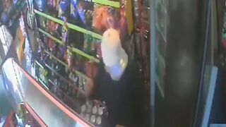 Young Student is Killed in Small Store Working