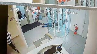 Madureira, Rio de Janeiro: Security Guard is Quicker on the Draw and Kills Robber in Bank (Happens Fast Left Side of Screen)