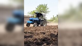 Another Indian Operating a Tractor