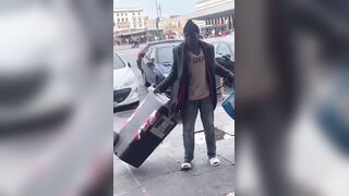 Aggressive Immigrant Threatens with Umbrella, Meets Flying Chair