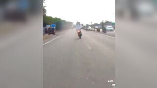 Poor Motorcyclist tries to Avoid Bicyclist and Unfortunately is Killed from Impact of Truck