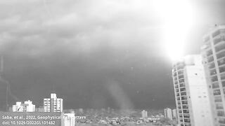 Slo-Motion video of Lightning Strike on some buildings.