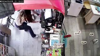 FULL Video from 2 Cameras: Pretty Female Employee tries to Stop Thief with Her Broom