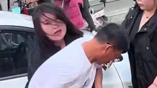 Chinese angry wife found mistress with her husband in his car