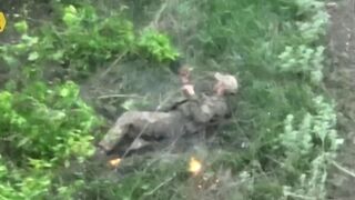 FULL VIDEO: Russian Soldier Hugs a Grenade: Crazy Combat Footage of Russian Troops being Ambushed (Skip to 2:15 if you're ADHD)