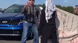 Driver Snaps on Queers for Palestine Morons Blocking the Exressway.