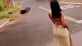 Pretty Girls in Brazil cause Motorcyclist to Spin Out then Laugh at Him