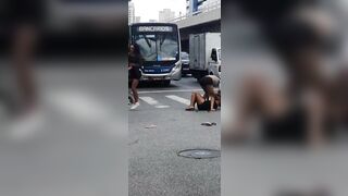 Only in Brazil..Bizarre Female Fight is Watched Over by One Legged Woman