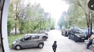 Samara Russia: A Man Jumps out the Window and almost takes a Child to the Grave with Him
