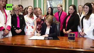 DEMONIC: Massachusetts Gov. Maura Healey Signs the Bill for Abortions up to Birth as White Liberal Woman Celebrate.