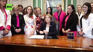 DEMONIC: Massachusetts Gov. Maura Healey Signs the Bill for Abortions up to Birth as White Liberal Woman Celebrate.