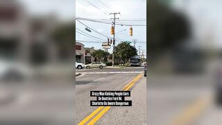 Another crazed black man in the streets of Charlotte attacking cars