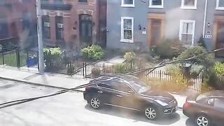 Female officer ran away as a man destroys her car and threw a stone at her