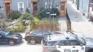 Female officer ran away as a man destroys her car and threw a stone at her