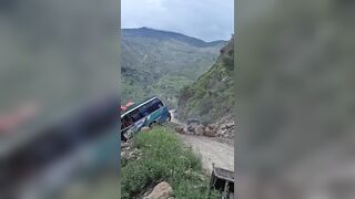 Massive boulder crushes stationary bus following a landslide in Nepal