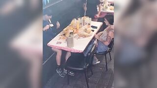 Family seen eating at a restaurant and then running out on the bill