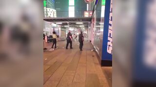 Man Detained and Tasered for Aggression Following Store Window Smash Attempt