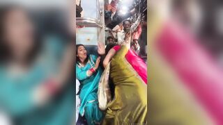 Indian women fighting for a seat in train