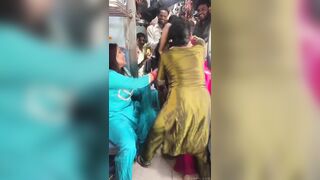 Indian women fighting for a seat in train