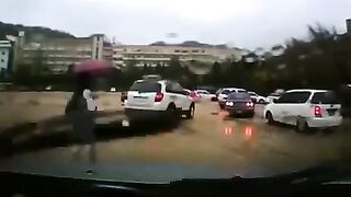 Driver somehow Does Not See Girl carrying Umbrella and Ruins her Life