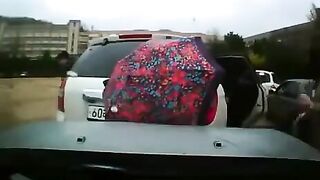 Driver somehow Does Not See Girl carrying Umbrella and Ruins her Life