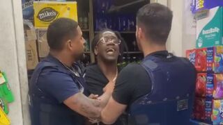 NYPD Warrant Officers Struggle to Handcuff Usual Suspect Refusing to Surrender
