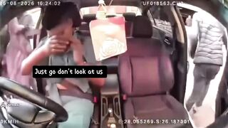 Dashcam camera captures a female Uber driver was robbed by men who had requested a pickup